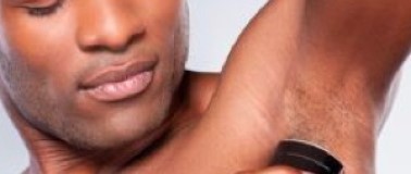 Man applying deodorant